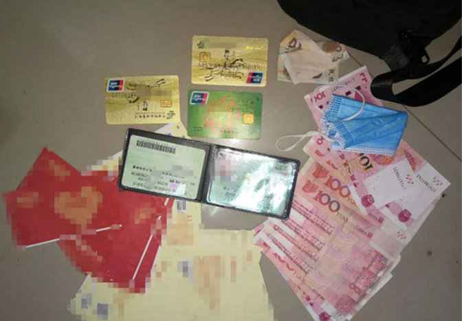 |小伙刚出家门捡个钱包 “出动出击”找失主